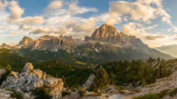 A view of mountains while the sun rises