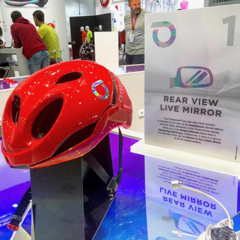 red helmet next to Rear View Live Mirror sign