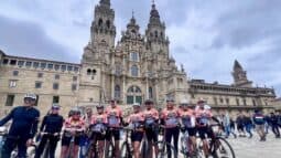Beautiful group of cyclists in front of the Barcelona Cathedral during a guided bike tour in Spain.