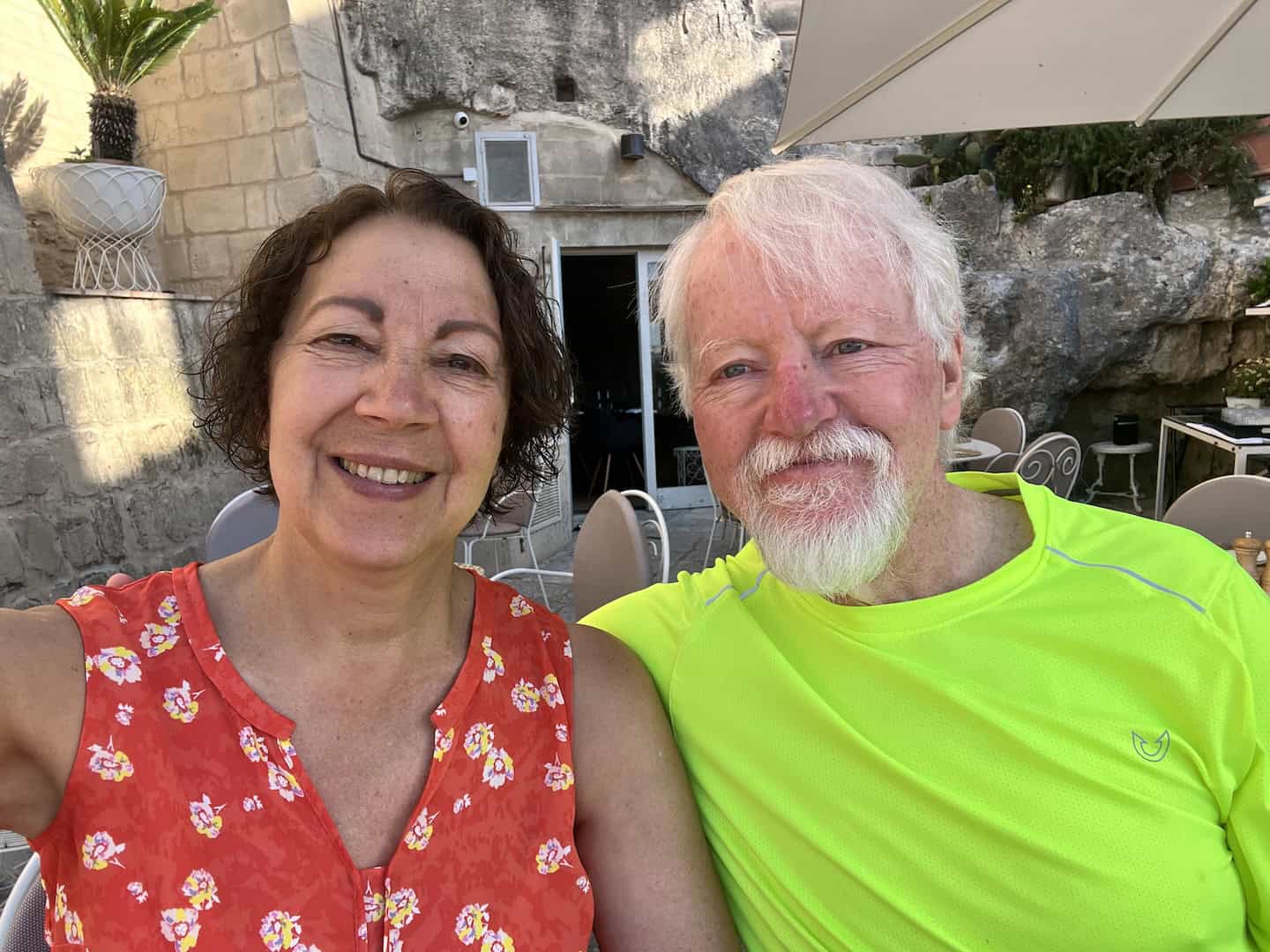 Smiling couple enjoying a bike tour in Italy, highlighting Ciclismo Classico's top bike tours and companies in Italy for cycling enthusiasts.